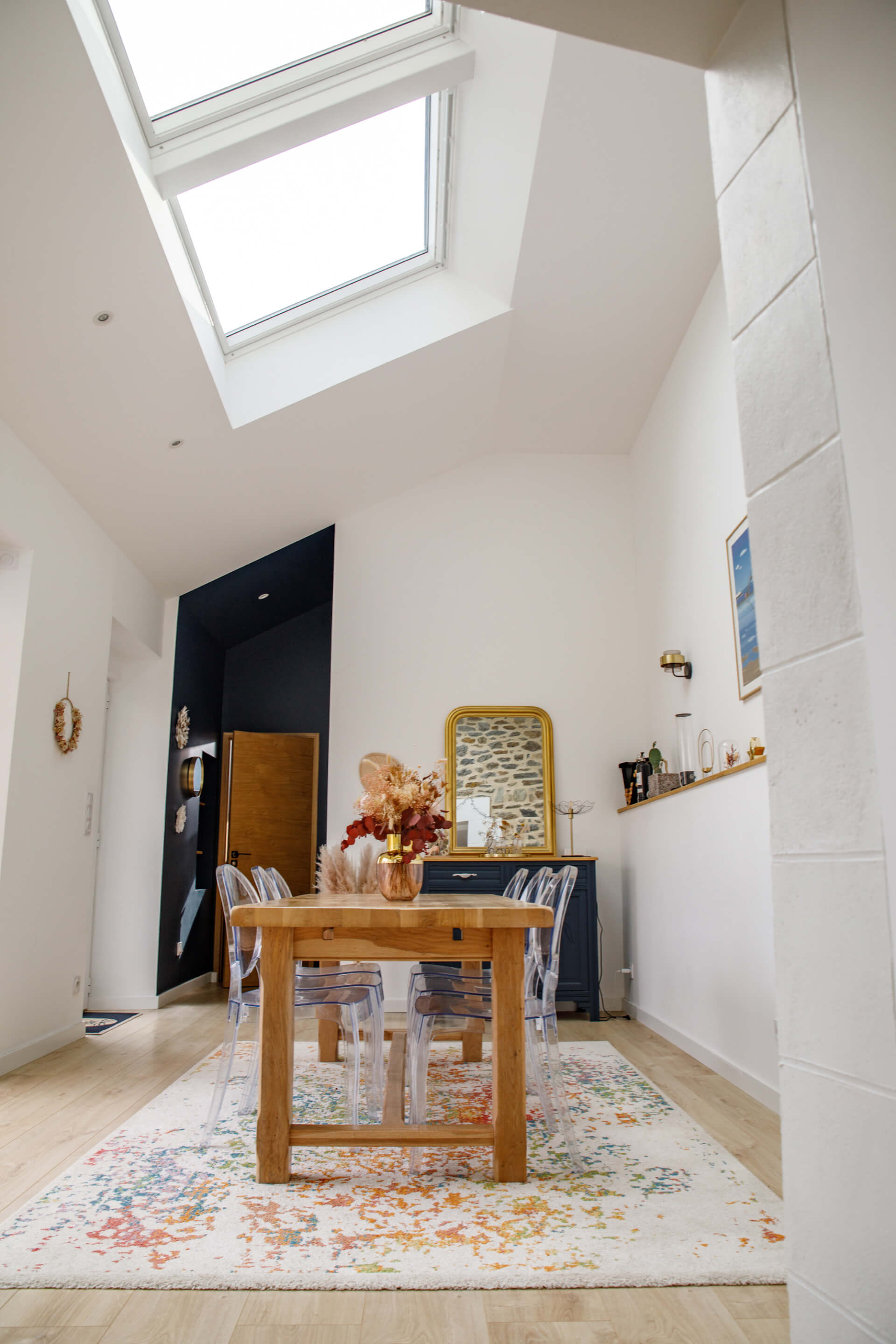 A dining area under the roof windows