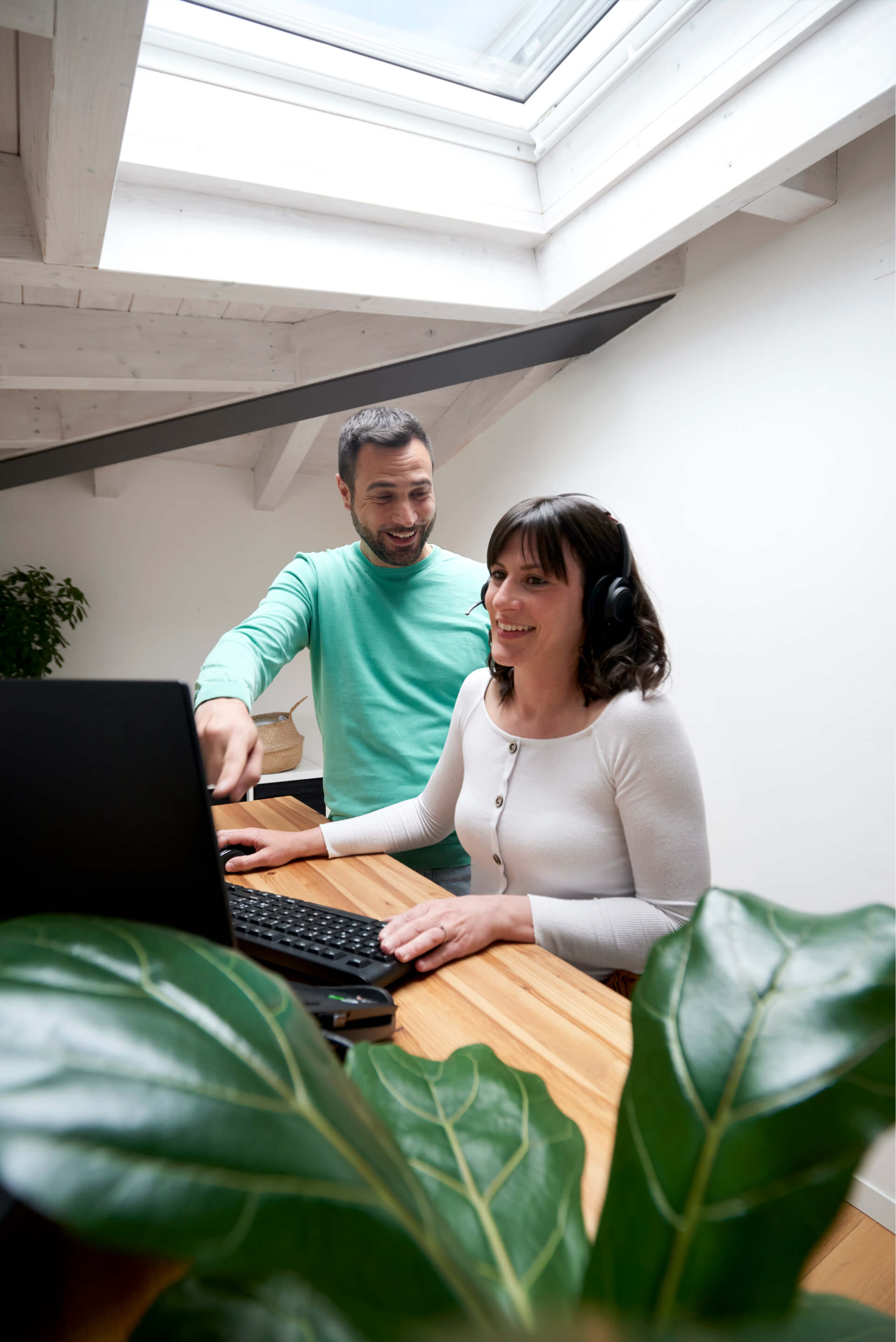 Home office space with a man and woman