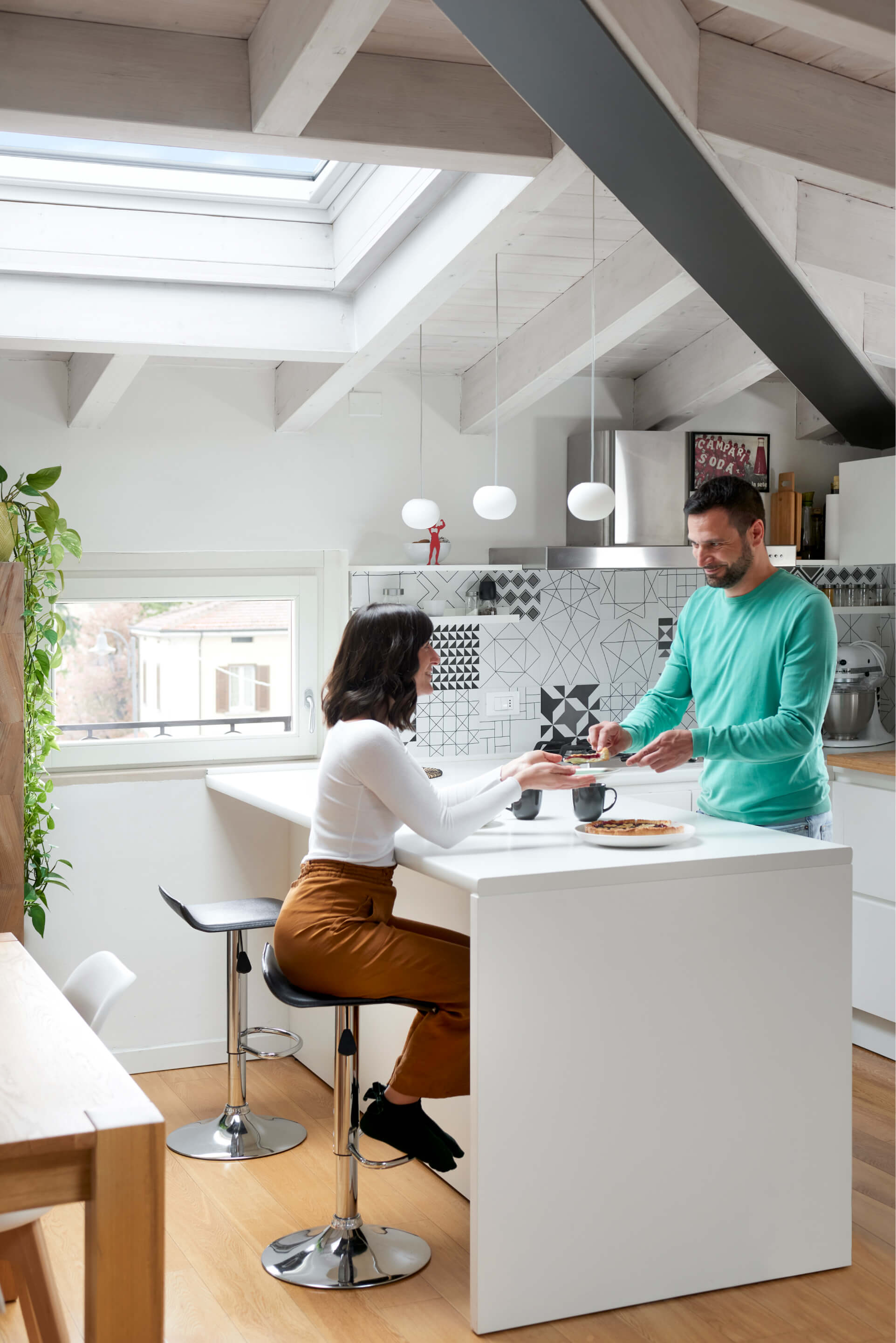 Kitchen interior with a man and a woman