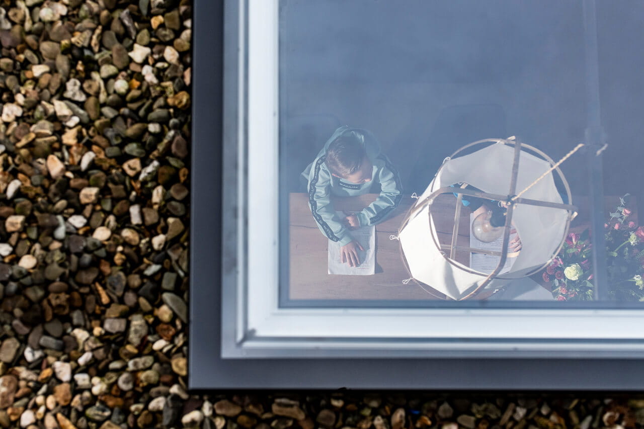 A view to the inside of the room through the roof window.
